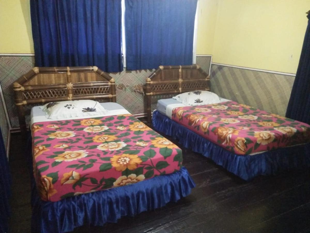 Roman Sinasi Hotel Tongging Exterior photo